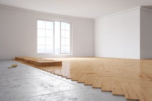 55681500 - laying out poplar hardwood in room in a house